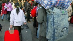 中国疫情失控官方无计发钱留人“过年”民间崩溃(图)