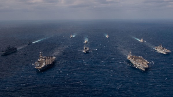 卡爾文森和林肯航母打擊群於2022年1月23日開始在南海開展雙航母軍演。