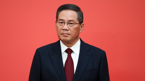 李强将接管李克强的总理职务，他将如何向影响中国经济走向，引发关注。（图片来源：Lintao Zhang/Getty Images）