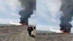 重庆机场飞机冲出跑道起火乘客惊慌跳机(图)