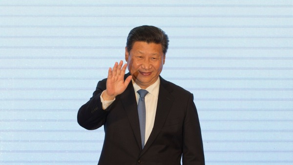 中共二十大再修党章进一步加强习近平权威及地位。（图片来源：Ng Han Guan-Pool/Getty Images）