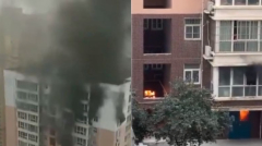 新疆大火民愤未息西安高楼火灾再酿5死(图)