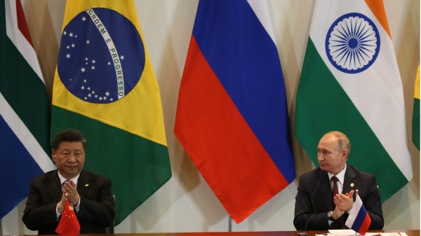 2019年11月14日，俄罗斯总统普京和习近平在巴西出席金砖会议。（图片来源：Mikhail Svetlov/Getty Images）