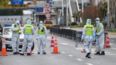 中国疫情爆雷日感染者超2万近52万人医护观察(图)