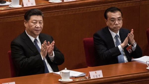 2022年3月5日的中共人大會議上，李克強和習近平出席。 （圖片來源：Kevin Frayer/Getty Images）