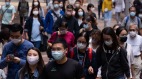 香港取消口罩令逾七成市民继续罩不离口(图)