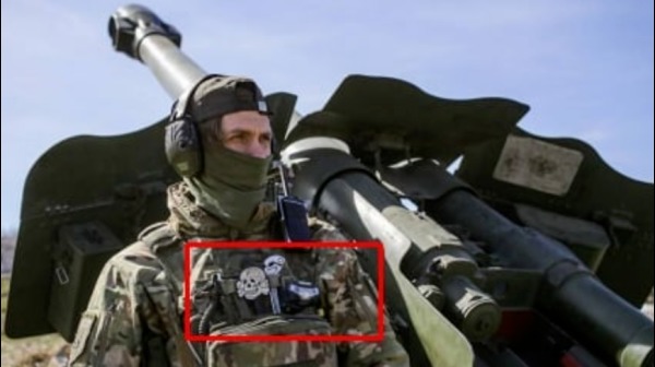 澤連斯基於5月發文之時，其中有一名烏克蘭砲兵被發現佩戴了納粹的骷髏頭（Totenkopf）徽記。