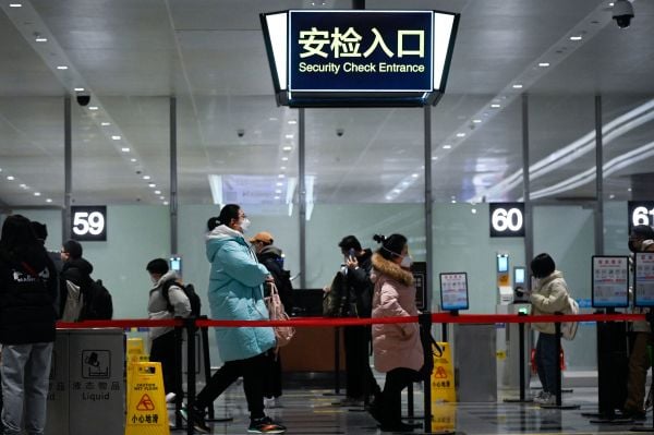 2023年1月19日，北京机场（图片来源：WANG ZHAO/AFP via Getty Images）