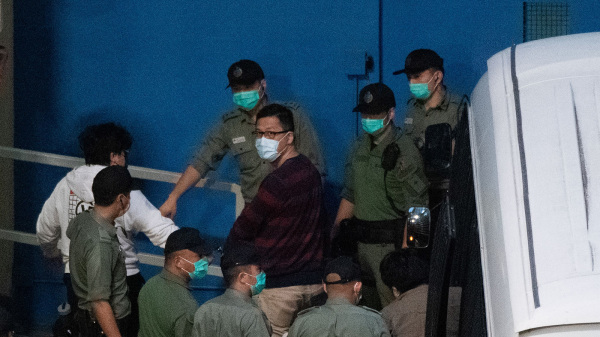 图为2021年3月香港前民主党立法会议员林卓廷被押送会荔枝角收押所。（图片来源：Getty Images）