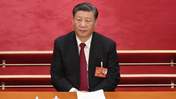 2023年3月5日，习近平出席第十四届全国人大第一次会议的开幕式。(图片来源：Lintao Zhang/Getty Images)