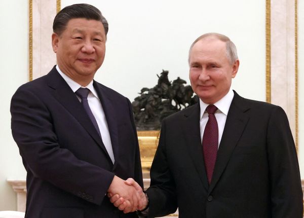 2023年3月20日，普京在克里姆林宫会晤习近平。(图片来源：SERGEI KARPUKHIN/SPUTNIK/AFP via Getty Images）