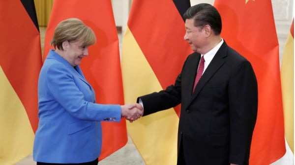 2018年5月24日，中国国家主席习近平（右）在中国北京人民大会堂会见德国总理安格拉．默克尔。