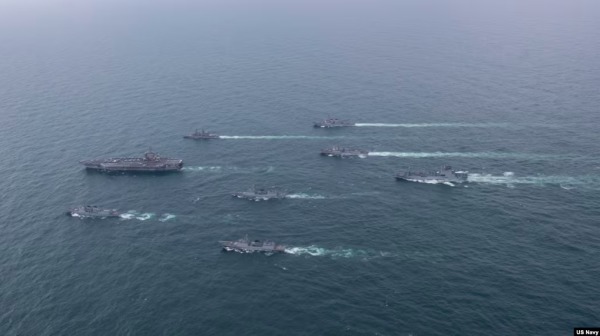 美國海軍公布2023年4月3日至4日間舉行美日韓三國海上聯合軍演的照片。