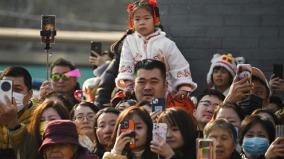 通貨緊縮房地產危機壓抑了新年氣氛(圖)