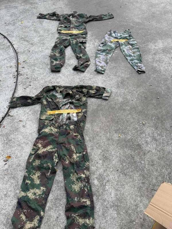 菲律宾突袭搜查一家非法离岸博彩公司时，竟然发现有疑似中国军服的物品。