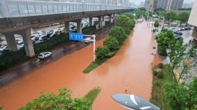 湖南平江特大洪水民众网上求救190座水库溢洪(图)