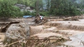 中國和尼泊爾邊境口岸泥石流17人失聯傳大橋被沖毀(組圖)