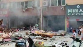 河南南阳商铺燃气大爆炸一排门店被毁20伤(图)